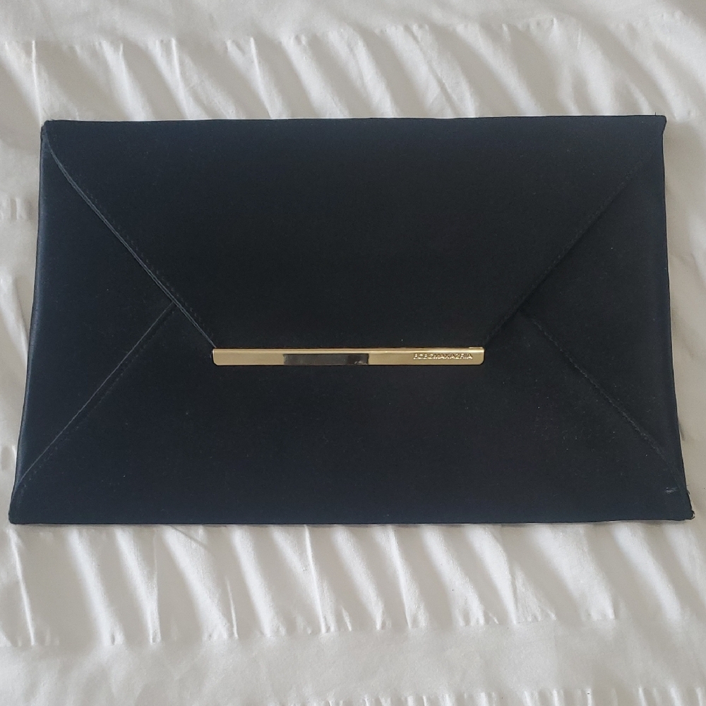 BCBGMaxAzria Black Clutch with Gold Detail